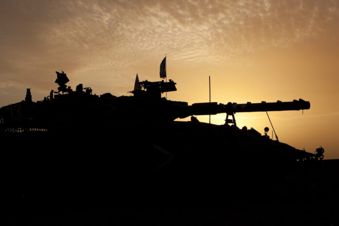 Tank silhouette at sunset Israeli tank Merkava